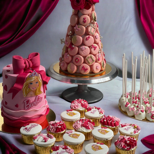 A collection of Barbie-themed cakes featuring intricate designs and vibrant colors, perfect for princess-themed parties and special occasions.